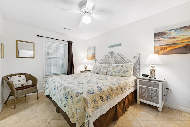 tiled bedroom with ceiling fan