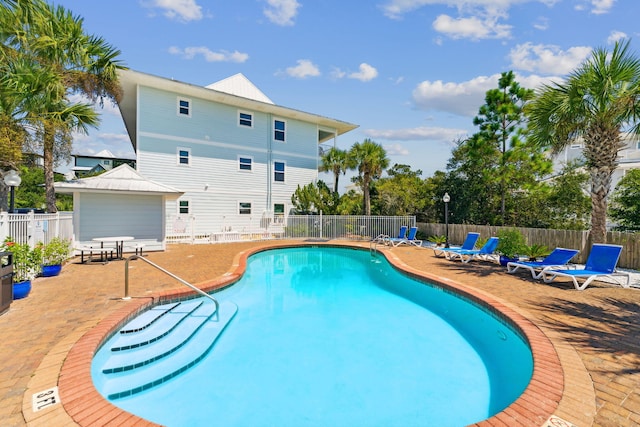 view of pool featuring a patio area