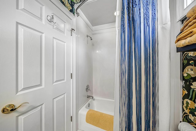 bathroom with shower / bath combination with curtain