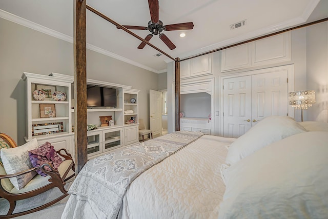 bedroom with a closet, ceiling fan, and ornamental molding