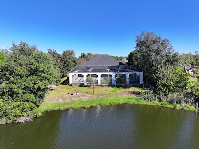 back of house with a water view