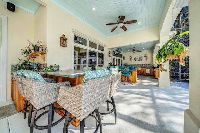 view of patio / terrace with an outdoor bar