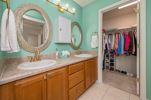 bathroom with vanity and tile patterned floors