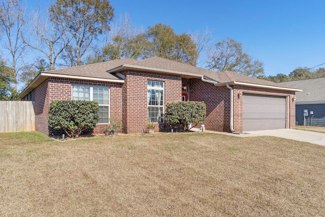 ranch-style house featuring a garage and a front lawn