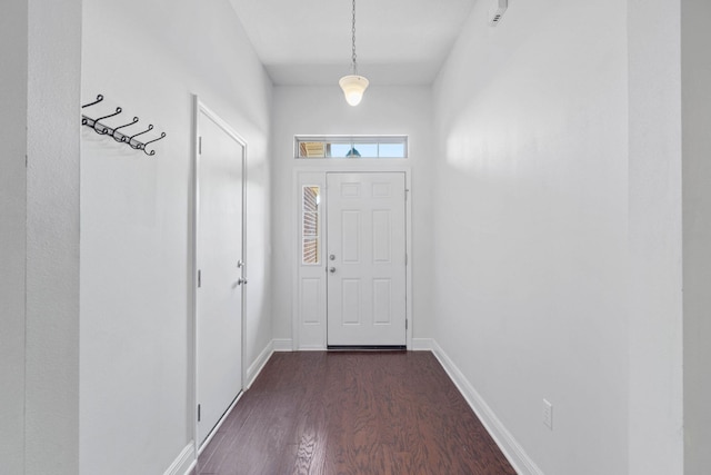 doorway to outside with dark hardwood / wood-style flooring