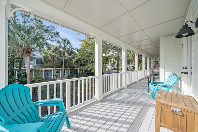 sunroom with a paneled ceiling