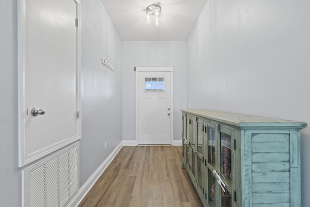 interior space with hardwood / wood-style flooring