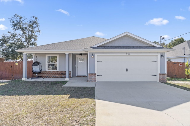 single story home with a front lawn, a porch, and a garage