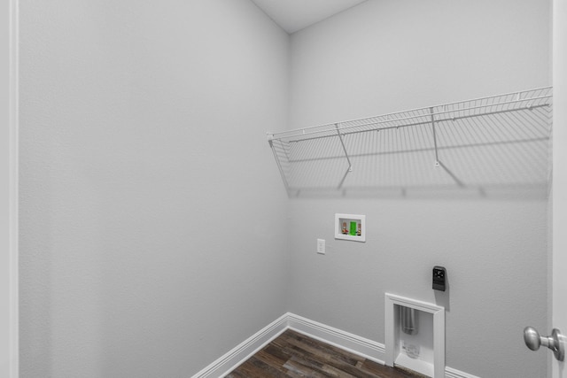 clothes washing area with hookup for a washing machine, dark wood-type flooring, and hookup for an electric dryer