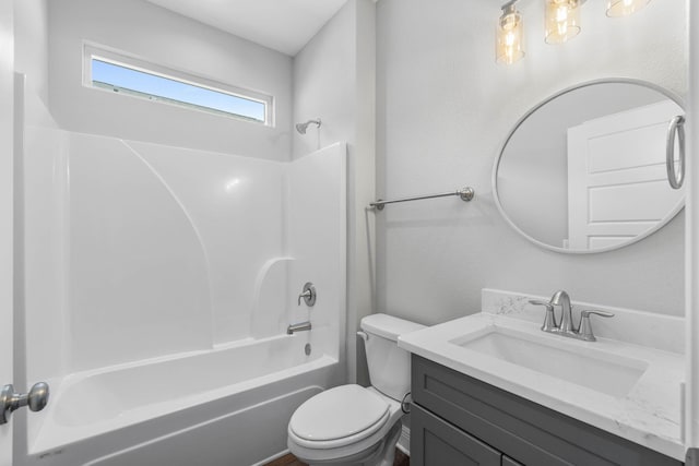 full bathroom featuring vanity, shower / bathtub combination, and toilet