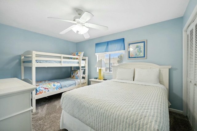 bedroom featuring carpet flooring, ceiling fan, and a closet