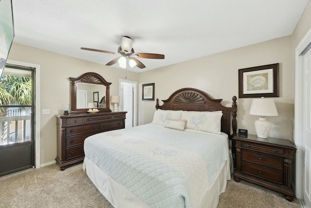 bedroom featuring light carpet and ceiling fan