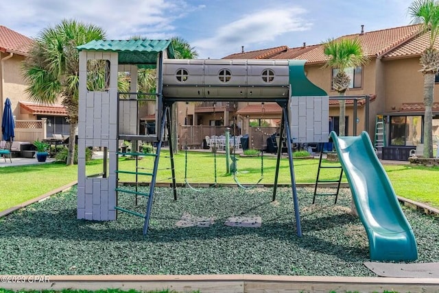 view of playground with a yard