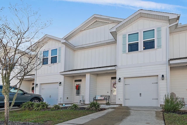 multi unit property featuring a garage