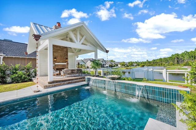 view of pool featuring a gazebo, pool water feature, and a water view