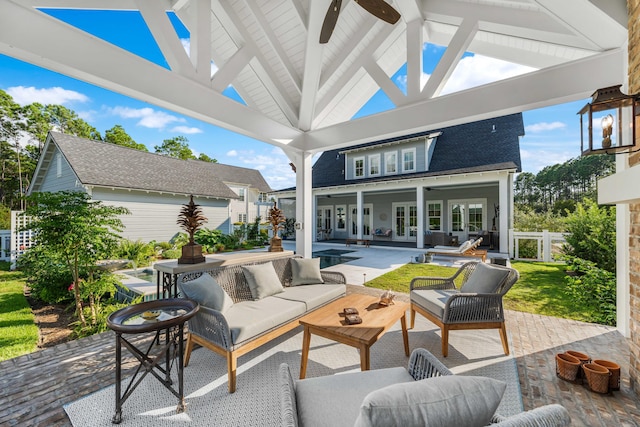 view of patio / terrace featuring a gazebo, an outdoor hangout area, french doors, and ceiling fan