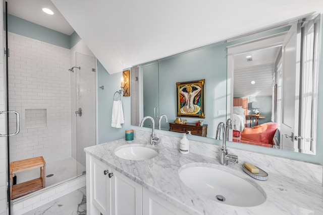 bathroom with vanity and walk in shower