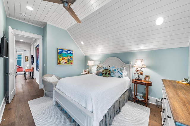 bedroom featuring dark hardwood / wood-style flooring, wooden ceiling, ceiling fan, and lofted ceiling