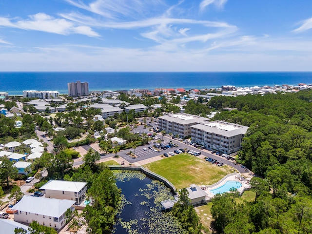 bird's eye view with a water view