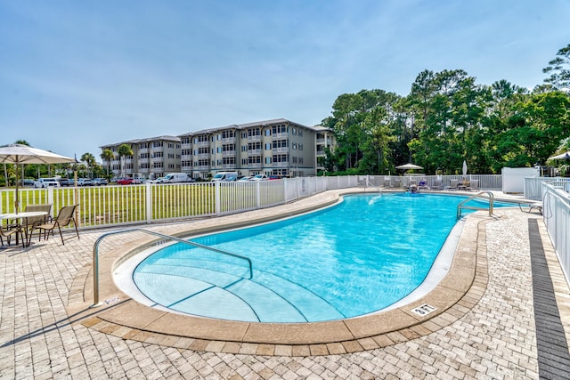 view of pool with a patio