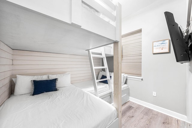 bedroom with light hardwood / wood-style floors