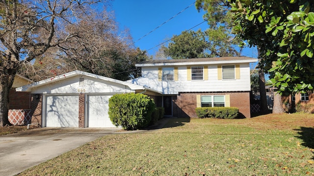 view of front of home featuring a front yard and a garage