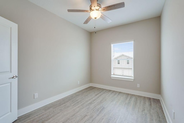 unfurnished room with light hardwood / wood-style flooring and ceiling fan