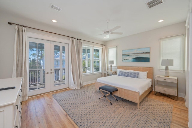 bedroom with access to exterior, ceiling fan, french doors, and light hardwood / wood-style floors