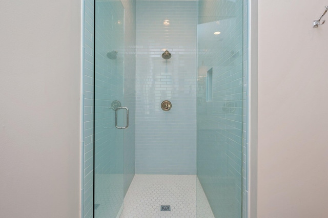 bathroom with an enclosed shower