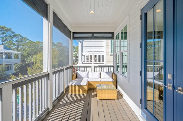 sunroom / solarium featuring plenty of natural light