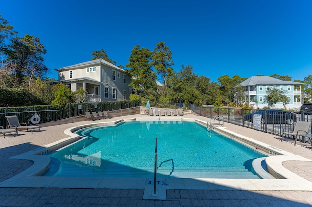 view of swimming pool featuring a patio