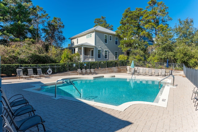 view of pool with a patio