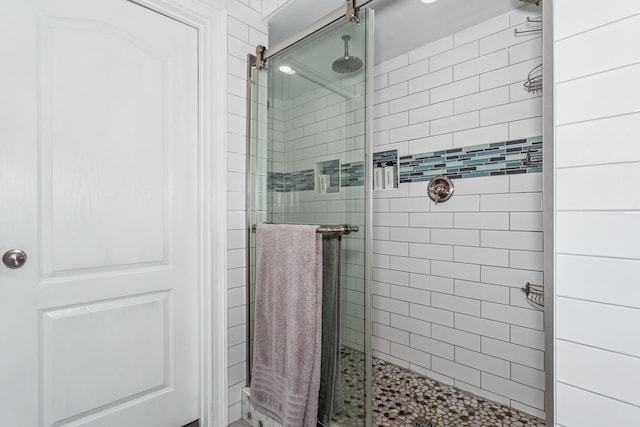 bathroom with an enclosed shower