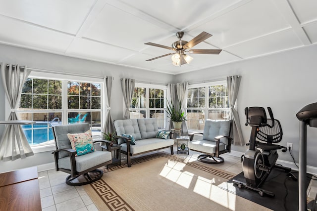 interior space with coffered ceiling and a wealth of natural light