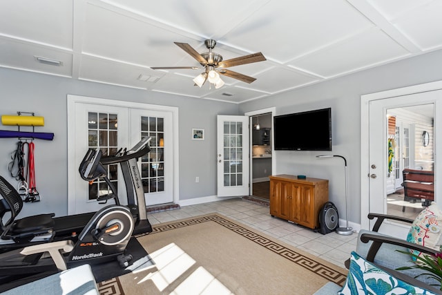 exercise room with light tile patterned floors, ceiling fan, and french doors