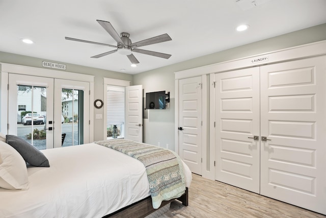 bedroom featuring access to outside, ceiling fan, french doors, and light hardwood / wood-style floors