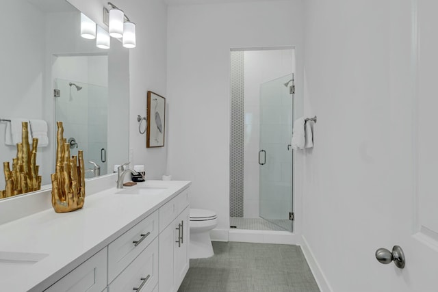 bathroom with vanity, toilet, and walk in shower