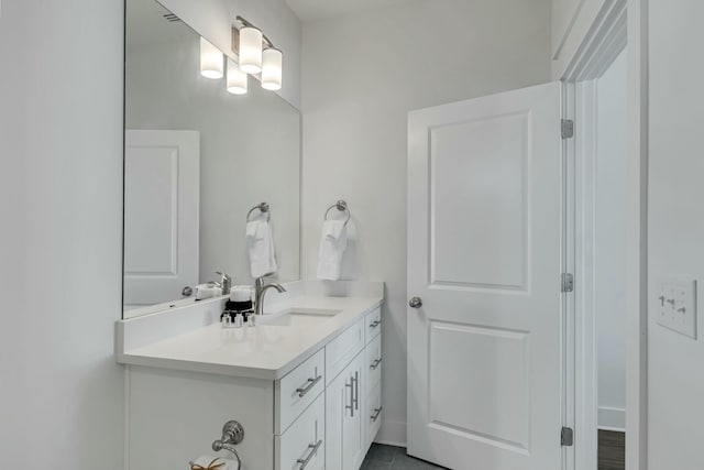 bathroom with vanity and tile patterned floors