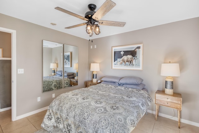 bedroom featuring ceiling fan and light tile patterned floors