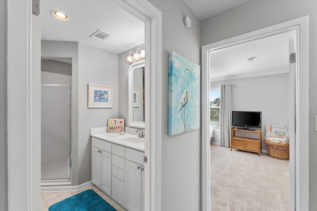 bathroom featuring vanity and walk in shower