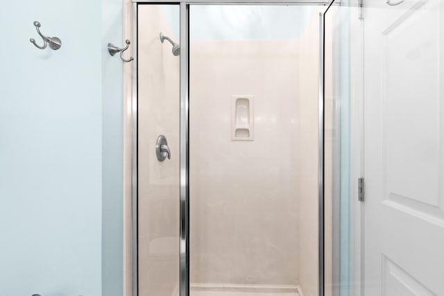 bathroom with an enclosed shower