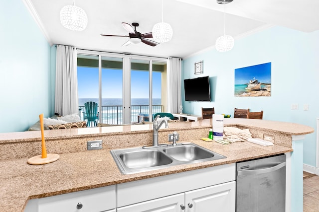 kitchen with stainless steel dishwasher, pendant lighting, white cabinetry, and ornamental molding