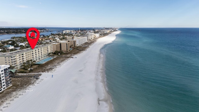 aerial view featuring a view of the beach and a water view