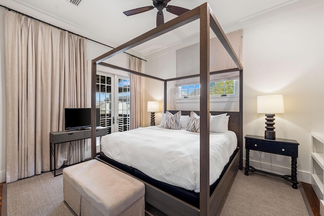 bedroom with light hardwood / wood-style flooring and ceiling fan