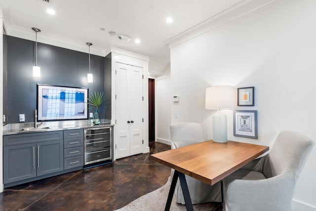 office with crown molding, sink, and beverage cooler