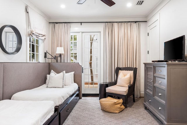 bedroom featuring ceiling fan and crown molding