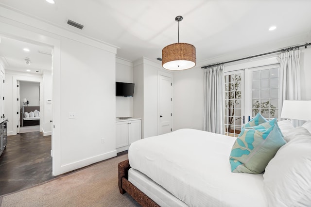 bedroom with ornamental molding