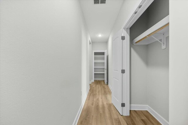 hall featuring light hardwood / wood-style flooring