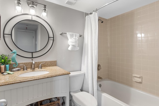 full bathroom featuring vanity, toilet, and shower / tub combo with curtain