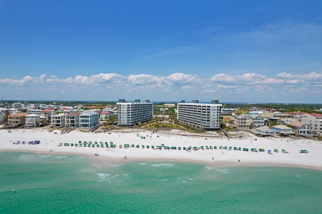 aerial view with a water view and a view of the beach